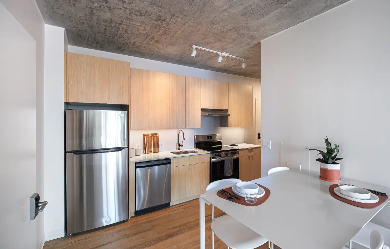 Kitchen and dining room at Straits Row - South Loop Apartments